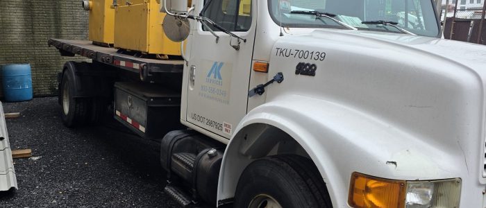 Side view of hook truck for sale.