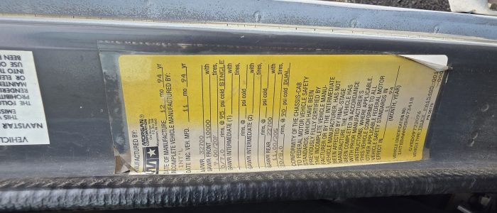 Manufacturing information for the hook truck for sale.